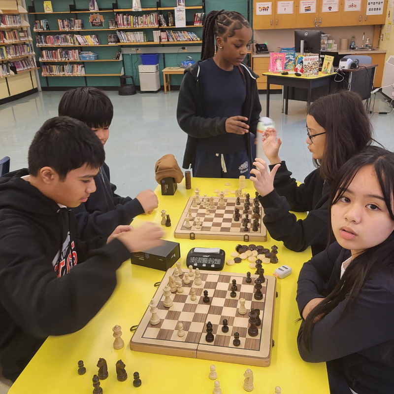 Photo of Blessed Trinity students playing chess