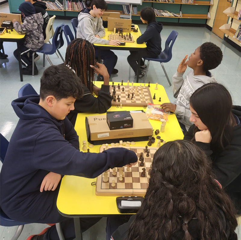 Photo of Blessed Trinity students playing chess