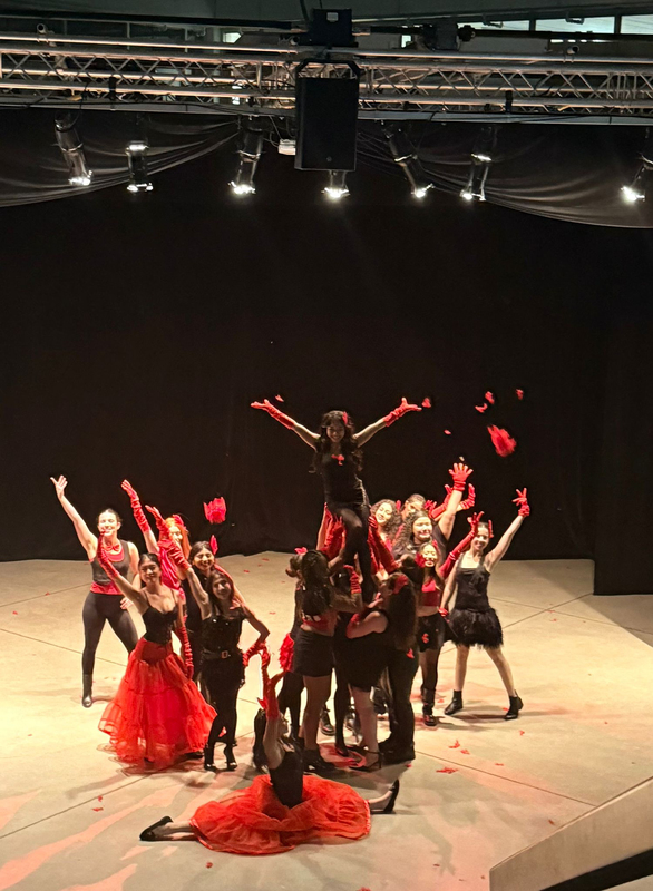 Photo of Loretto College School students performing on stage