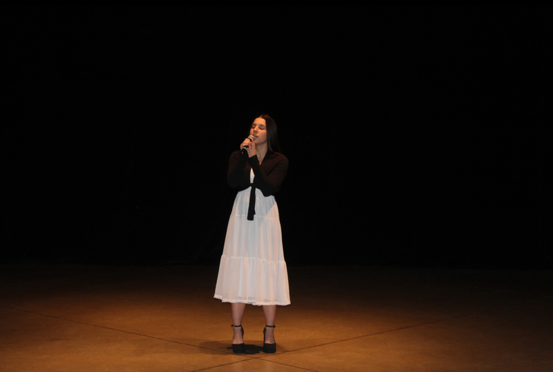 Photo of Loretto College School student performing on stage