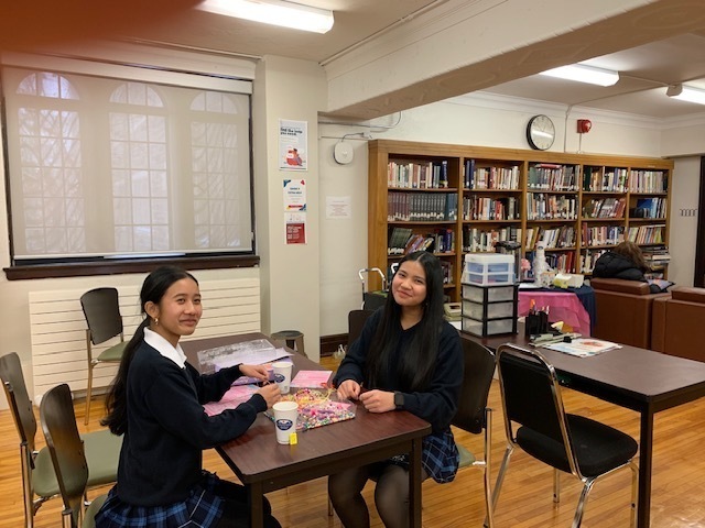 Photo of Loretto Abbey students doing a craft activity together