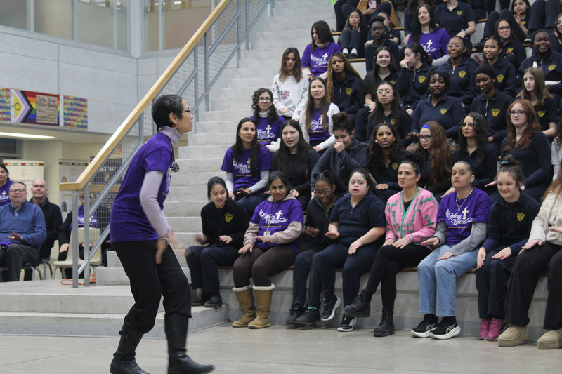 Photo of TCDSB staff member A. Ferrer leading attendees in an activity