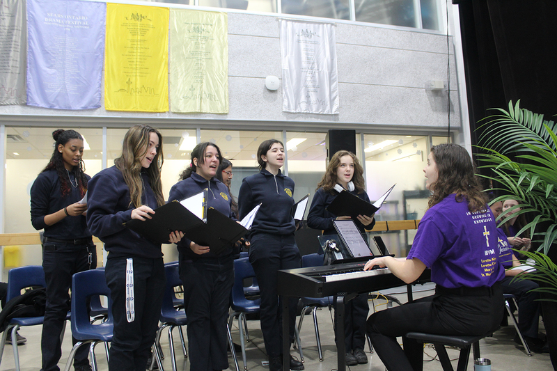 Photo of students performing a song