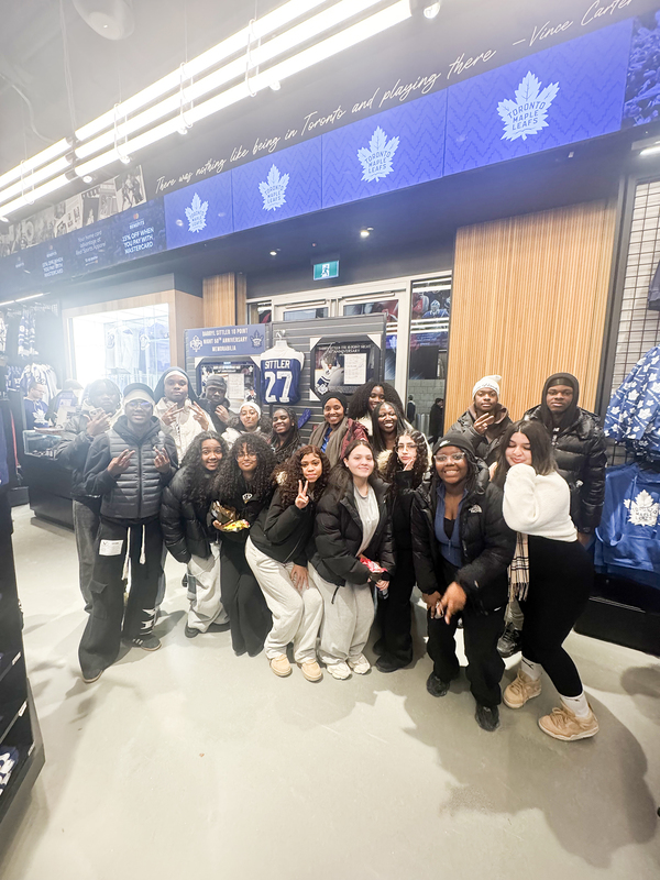 Group photo of Father Henry Carr students at the game