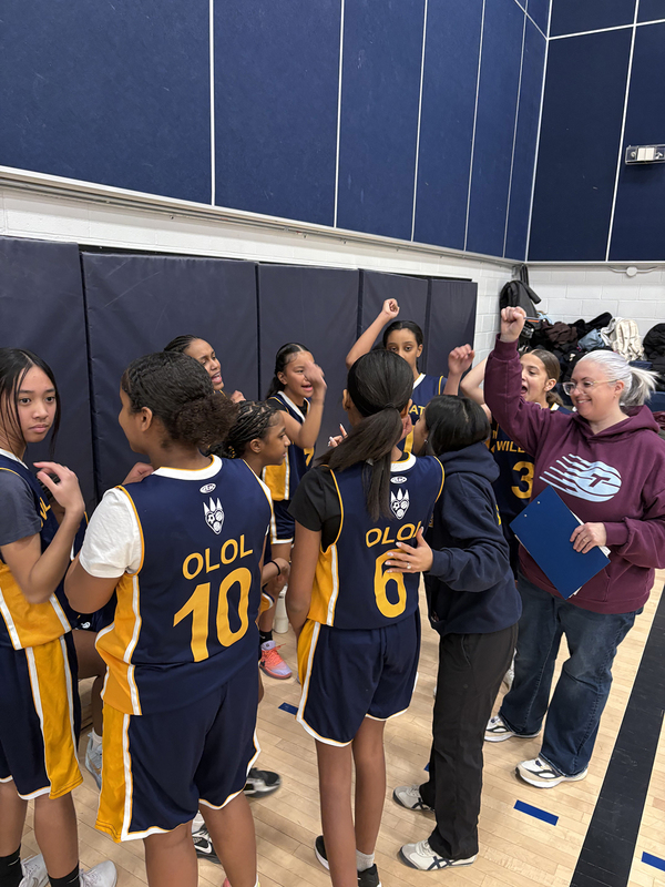 Photo of the teams on the court