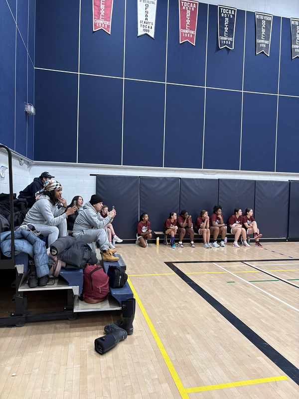 Photo of the teams on the court