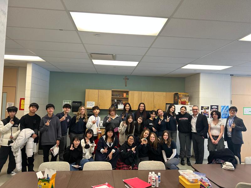 A group of students and faculty in a classroom.