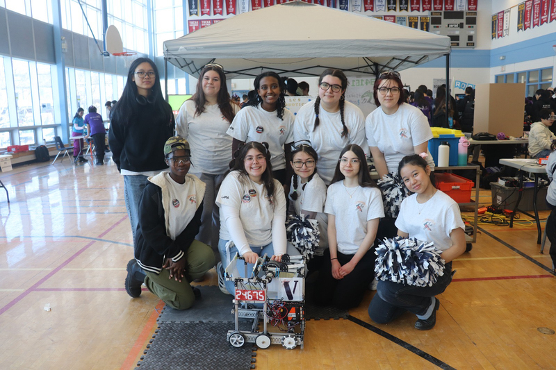 Photo of Loretto College School's robotics team with the robot they built