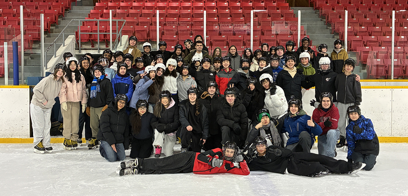 Photo of students and staff at the camp retreat