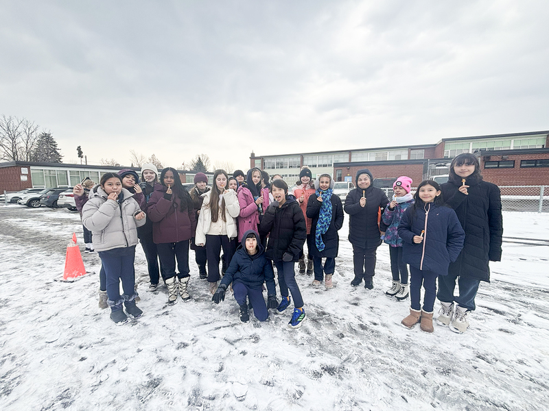 Photo of students enjoying their maple taffy