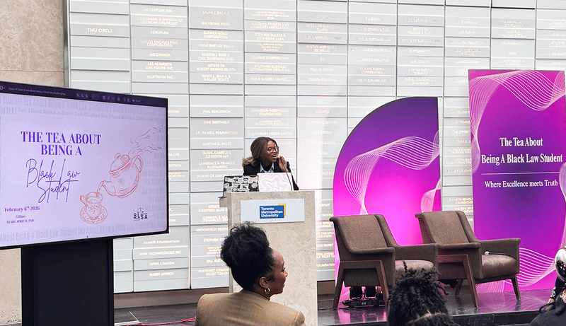 Photo of two law professionals speaking at the podium during the event