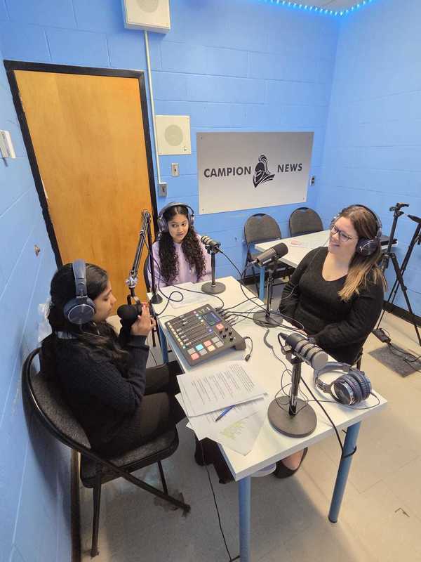 Photo of St. Edmund Campion students and teacher in the studio