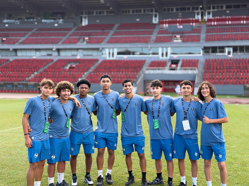 Photo of Joel with his teammates