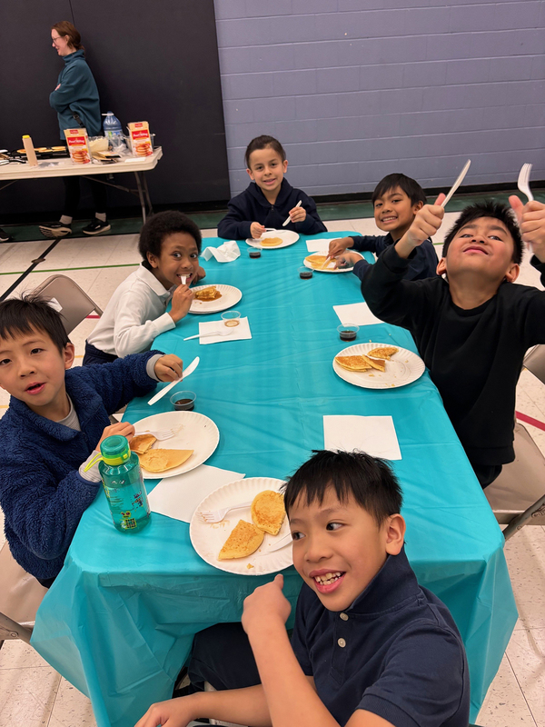Photo of Blessed Trinity students enjoying their pancakes