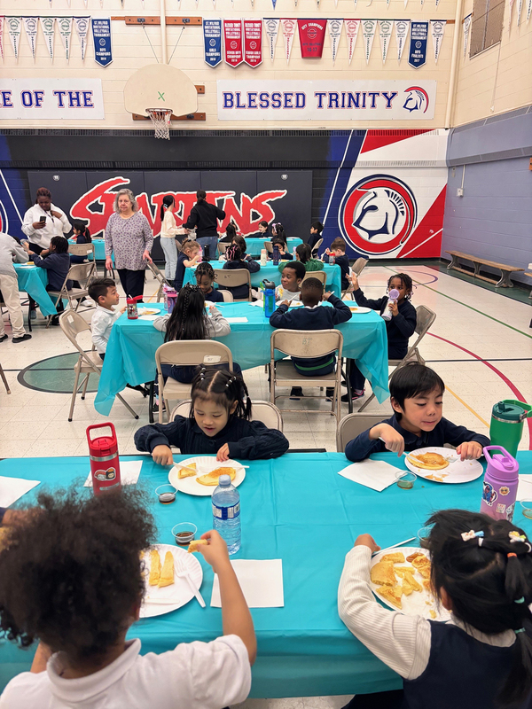 Photo of Blessed Trinity students enjoying their pancakes