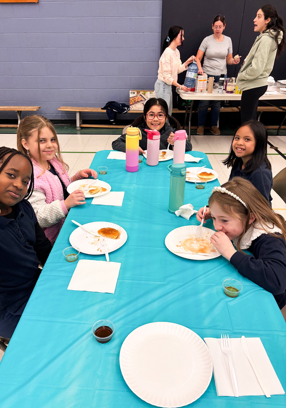 Photo of Blessed Trinity students enjoying their pancakes