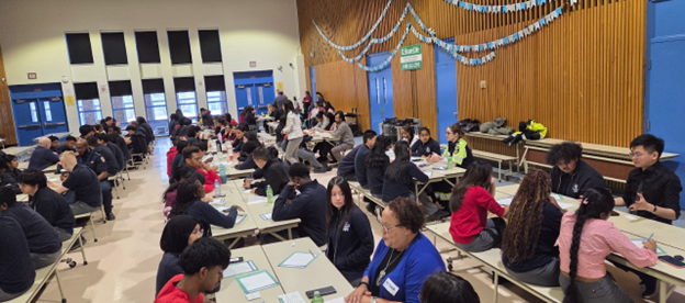 Photo of SJOA students conversing with coaches during the event