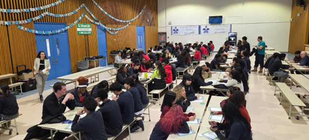 Photo of SJOA students conversing with coaches during the event