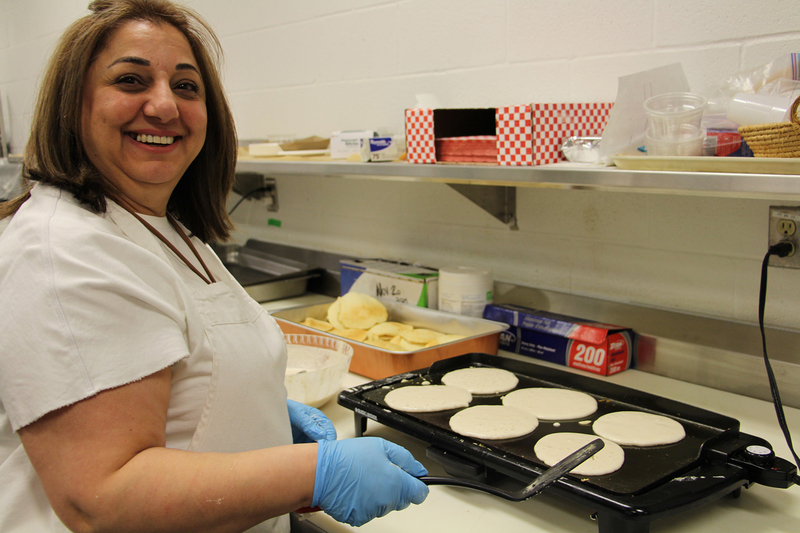 Photo of MPJ community members making pancakes