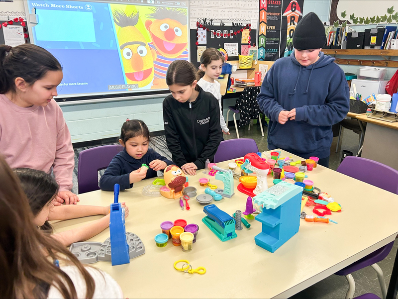 Photo of students doing activities together in the One Love Club