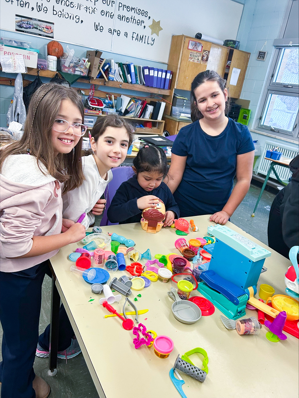 Photo of students doing activities together in the One Love Club