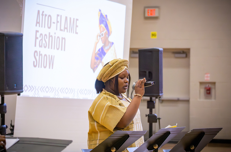 Student giving a speech at the event