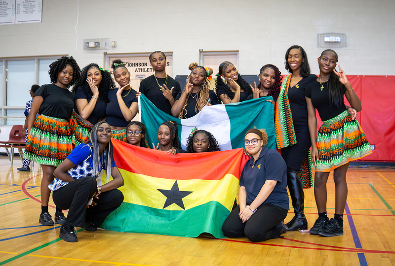 Photo of student performers with the country flags