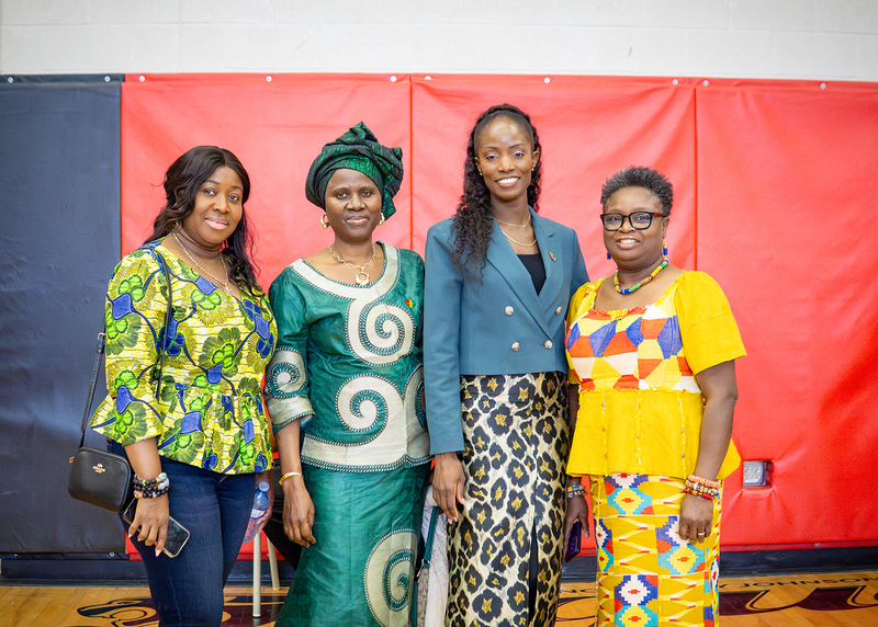 Photo of attendees to the event in traditional African clothing and style