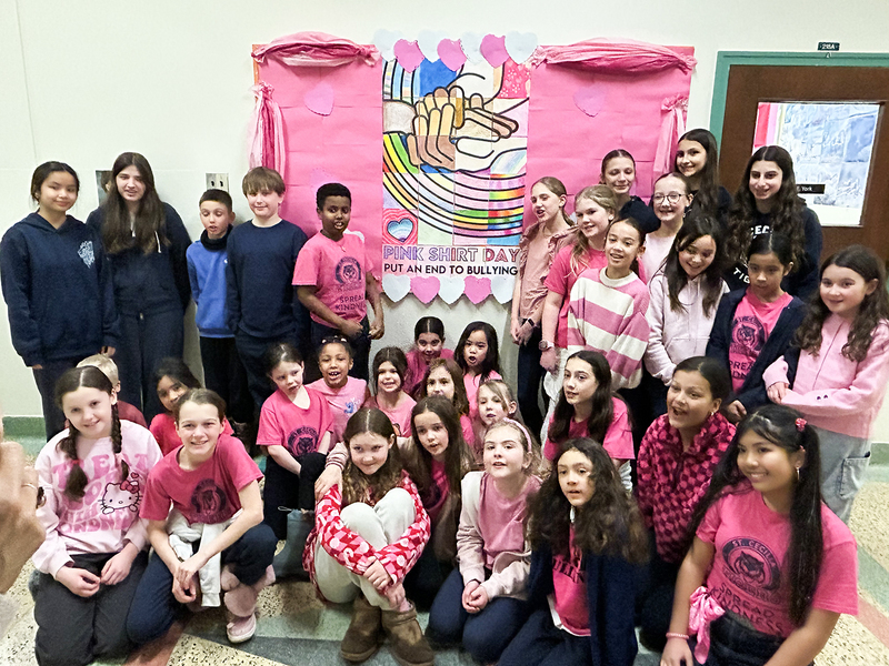 Group photo of St. Cecilia students with their finished artwork project