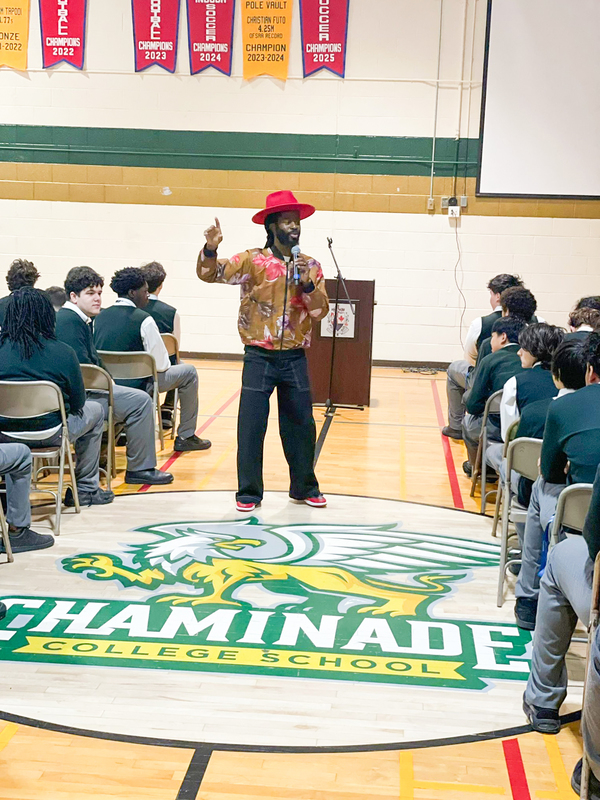 Photo of Randell speaking to Chaminade students