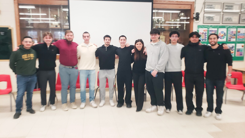 Photo of the speakers with Chaminade staff