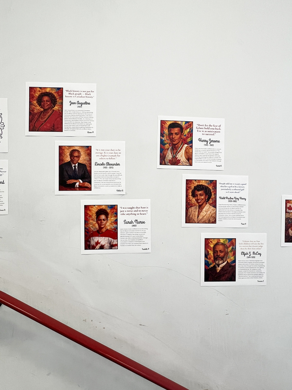 Photo of St. Anthony school halls decorated with posters showing the portraits of influential Black Canadians along with explanations of what they did