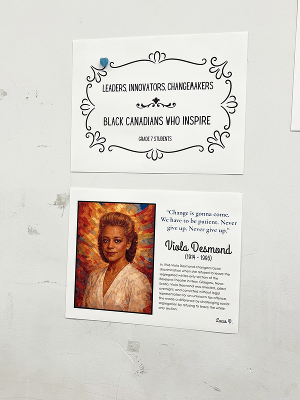 Photo of St. Anthony school halls decorated with posters showing the portraits of influential Black Canadians along with explanations of what they did, in this case Viola Desmond