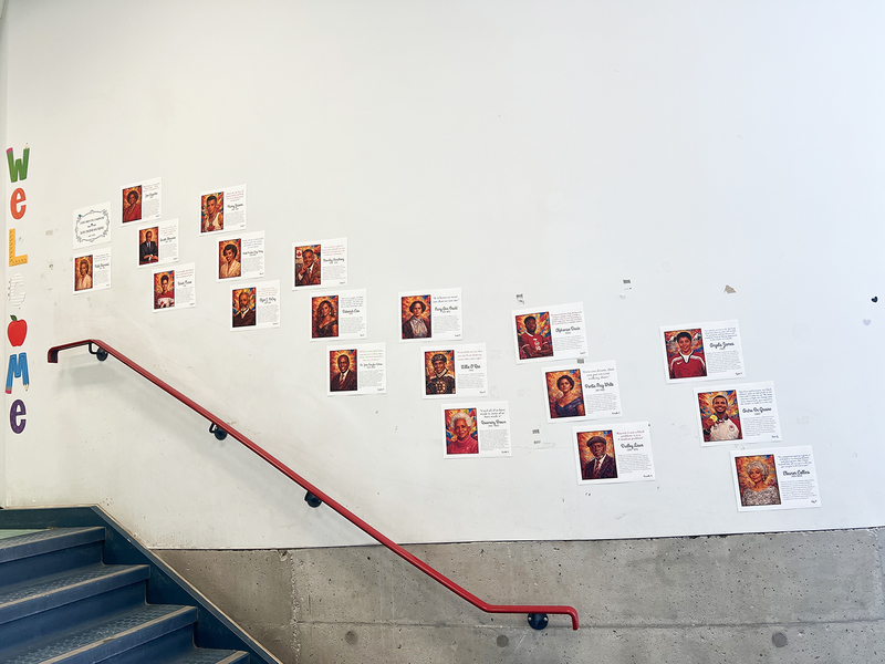 Photo of St. Anthony school halls decorated with posters showing the portraits of influential Black Canadians along with explanations of what they did