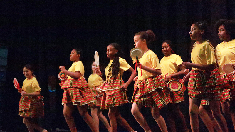 Photo of students performing at the Cultural Exposé
