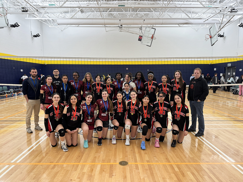 Group photo of the St. Patrick team with their medals