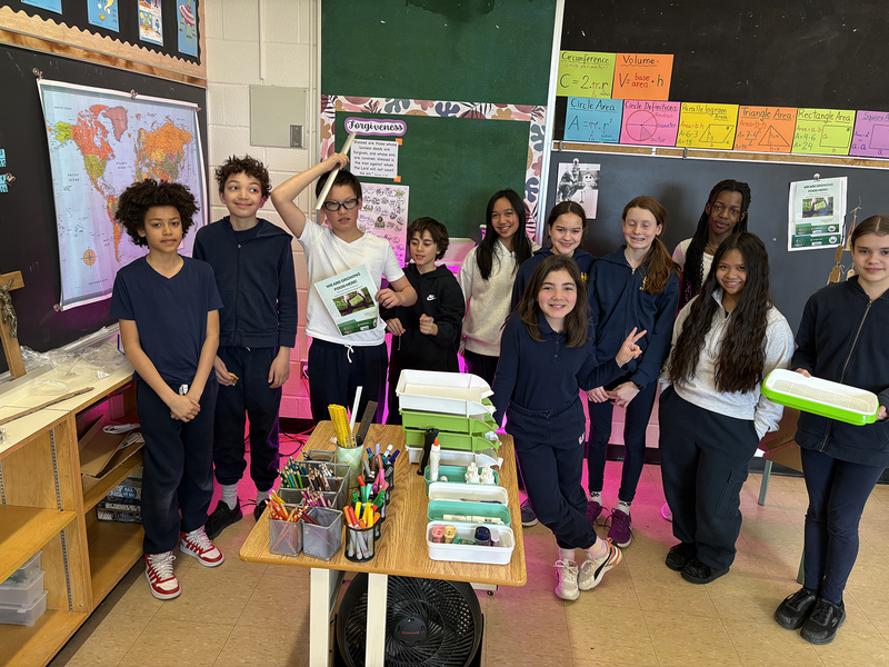 Group photo of students involved in the program along with their equipment