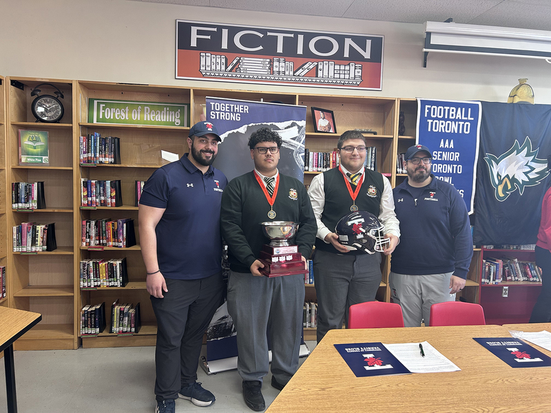 Photo of Chaminade students with their award trophies and medals