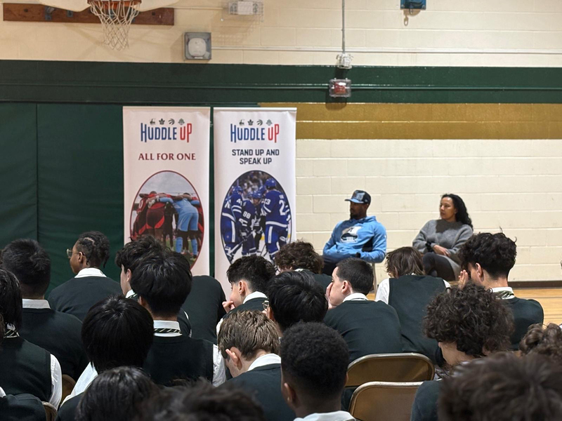 Photo of Chaminade students listening to speaker at the assembly