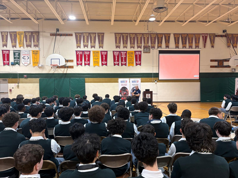 Photo of Chaminade students listening to speaker at the assembly