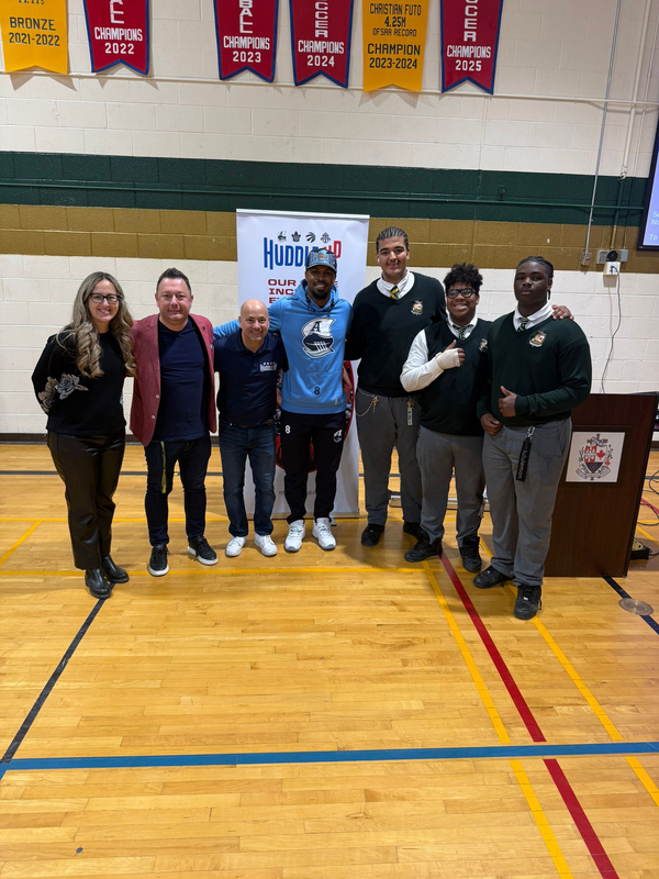 Photo of Chaminade students listening to speaker at the assembly