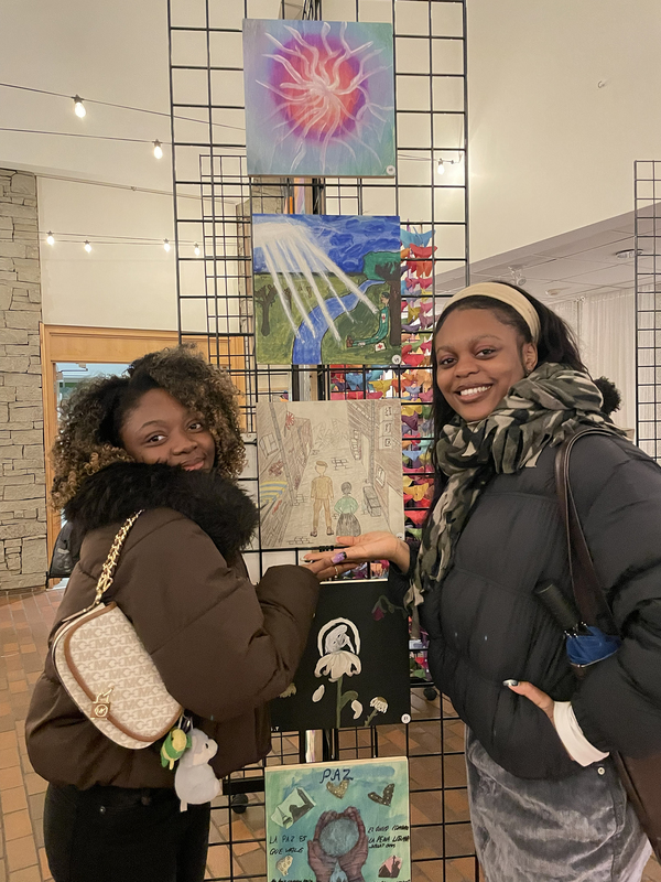 Photo of students with the display