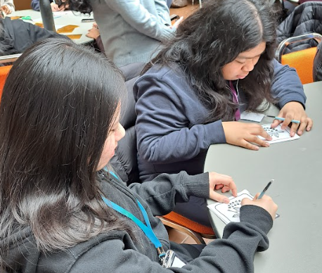 Photo of students trying out one of the activities