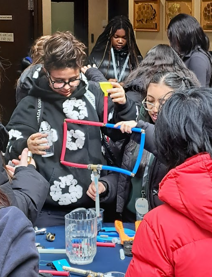 Photo of student trying out one of the activities