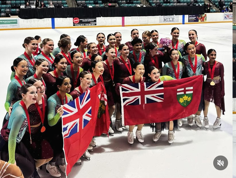Group photo of the Meraki team with Leah