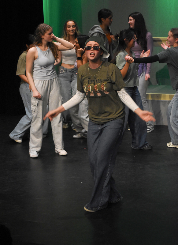 Photo of Redmond students performing on stage