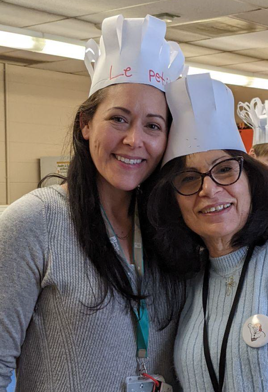 Photo of two staff members during the baking workshop