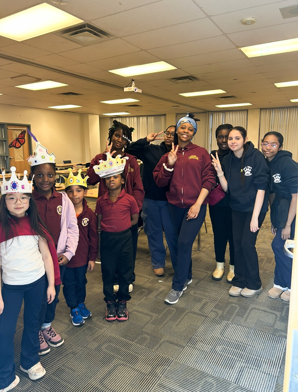 Photo of students with the crowns they designed