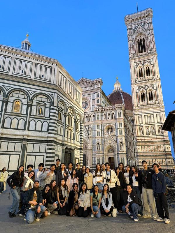 Young adults posing outdoors in Europe