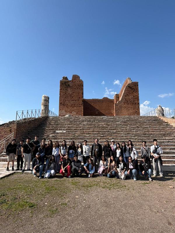 Young adults posing outdoors in Europe